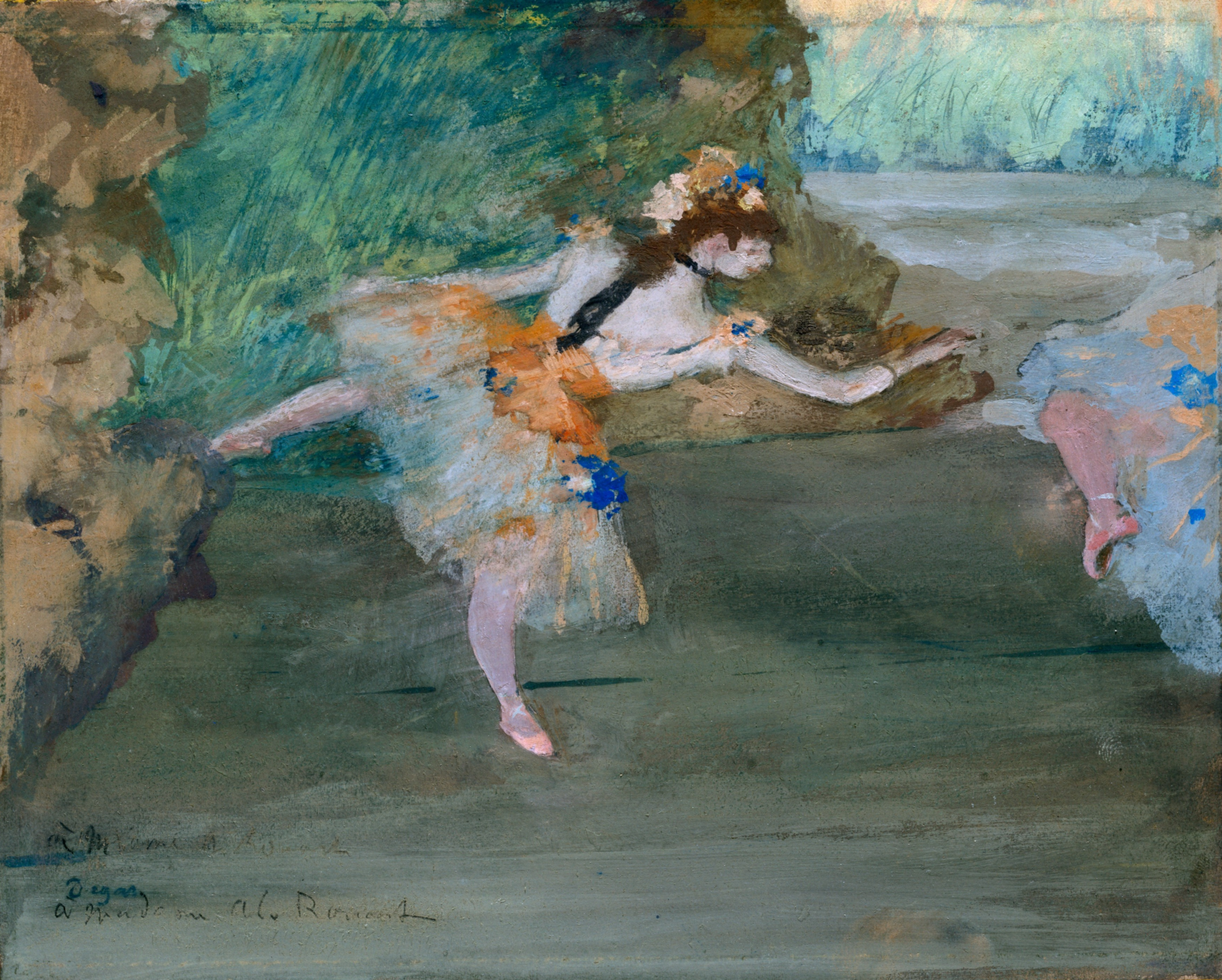 A dancer in a pale costume with orange and blue accents leans forward on a green-gray stage.