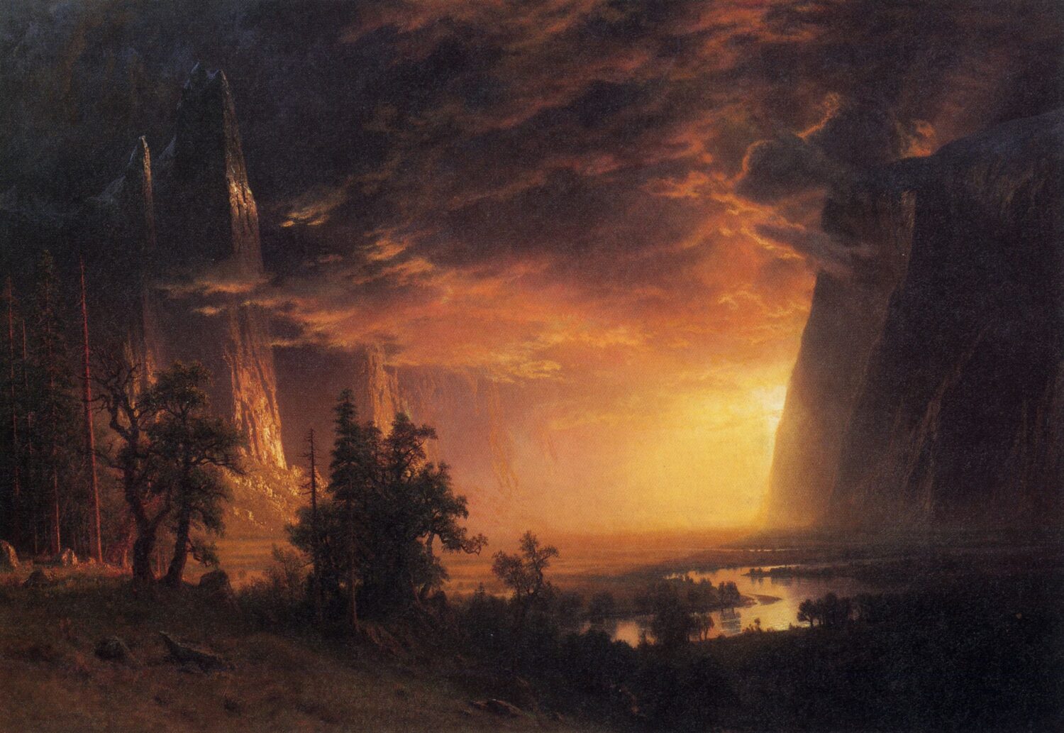 Sunset in the Yosemite Valley by Albert Bierstadt, with fiery clouds, towering cliffs and a winding river.
