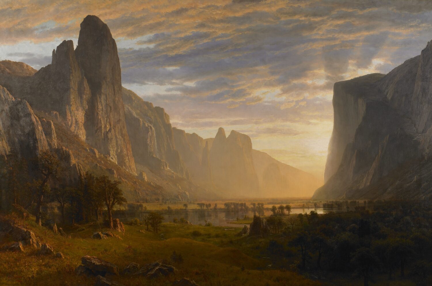 Looking Down Yosemite Valley, California by Albert Bierstadt, with golden light between towering granite cliffs.